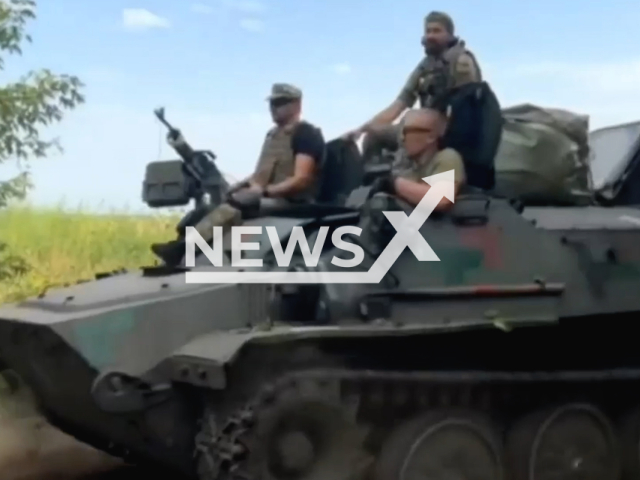 Picture shows soldiers of the 128th Transcarpathian brigade on a fighting vehicle in Ukraine in undated footage.
The 128th Separate Mountain Assault Transcarpathian Brigade is a mountain infantry unit of the Ground Forces of Ukraine.
Note: This picture is a screenshot from the video. (@128brigade/Newsflash)