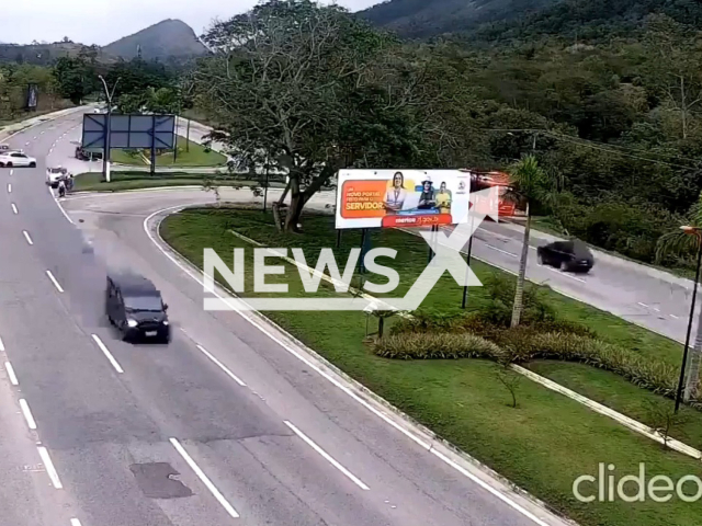 A car hits pedestrians waiting to cross the road, in Marica, Brazil, on Tuesday, Oct. 4, 2022. Another car  made  an illegal manoeuvre on the RJ-106, and the driver swerved to avoid it, two people died and three injured. Note: Picture is a screenshot from a video (Newsflash)