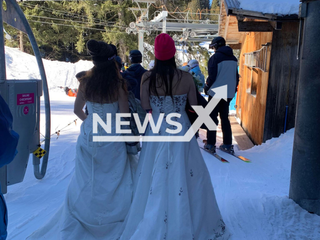 Sisters Sandra Vonlanthen, aged 31, and Andrea, aged 30, who celebrated their divorces by going skiing in their wedding dresses in the Saanenmoser ski area located in the Bernese Highlands in Switzerland. Note: We have obtained permission to use this photo by Sandra Vonlanthen. (Sandra Vonlanthen/Newsflash)