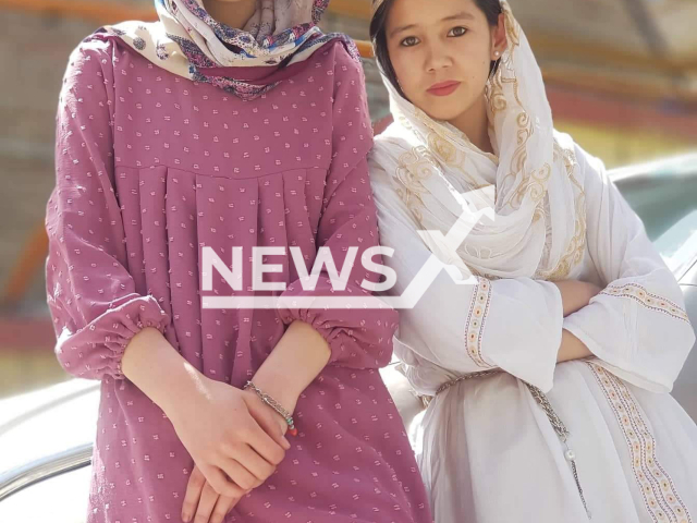 Marzia Mohammadi (left) and Hajar Mohammadi pose in an undated photo. They were best friends and cousins who died in a suicide bombing at a school in Kabul, Afghanistan, Friday, Sept. 30, 2022. Note: Picture is private (@modaqeq/Newsflash)