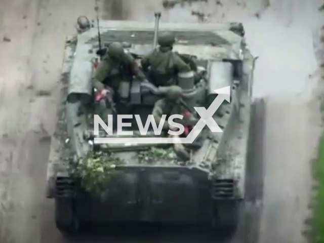 Picture shows Russian soldiers on a BMP-2M before it was destroyed by the Ukrainian Armed Forces in Ukraine in undated footage.
The BMP-2 is an amphibious infantry fighting vehicle introduced in the 1980s in the Soviet Union, following on from the BMP-1 of the 1960s.
Note: This picture is a screenshot from the video. (@AFUStratCom/Newsflash)