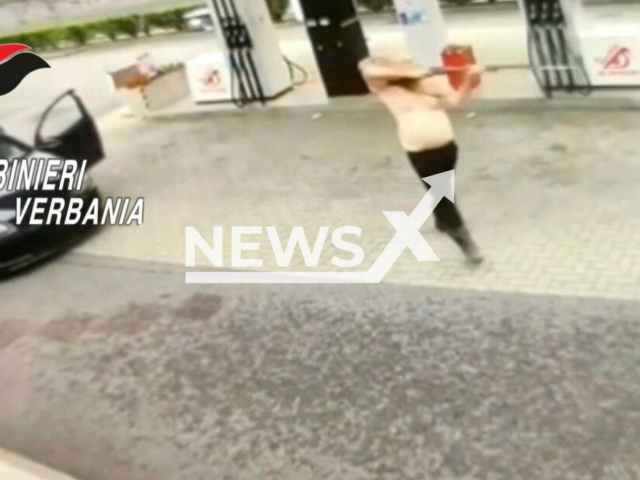 A 31-year-old shirtless Swiss man armed with a rifle threatened motorists at a petrol station,  in Baveno, Italy, on, Saturday, Oct. 8, 2022. He rammed about fifteen cars during a chase with police before being arrested, and according to investigators he is a right-wing extremist.  Note: Police photo. (Verbania Carabinieri/Newsflash)