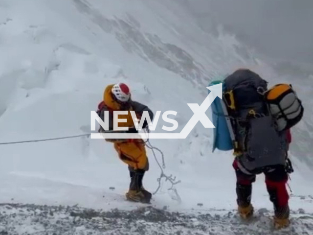 Picture shows mountaineers on Broad Peak, in Pakistan, on Monday, July 11, 2022.  Hakon Asvang, 52, from Norway, has climbed the Seven Summits. Note: Photo is a screenshot from the video (@hakonasvang/Newsflash)