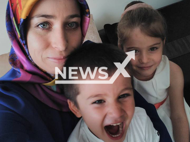 Zuhal Ugur, 42, poses with her children in an undated photo. She was allegedly killed by her estranged husband, Mehmet Ugur, 47, along with her children in Altindag, Ankara, Turkey. Note: Picture is private (@zuhal.celikugur/Newsflash)