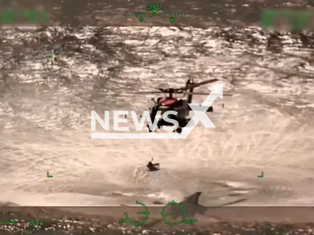 The Coast Guard rescues three boaters approximately 25 miles offshore from Empire, Louisiana, USA on Sunday, Oct. 9, 2022. Note: Picture is a screenshot from video. (U.S. Coast Guard District 8, DVIDS/Newsflash)