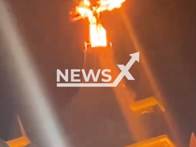 Cross in a church tower catches fire in the municipality of Missao Velha in the state of Ceara in Brazil. Note: This picture is a screenshot from the video (@mariana.correia.5682/Newsflash).