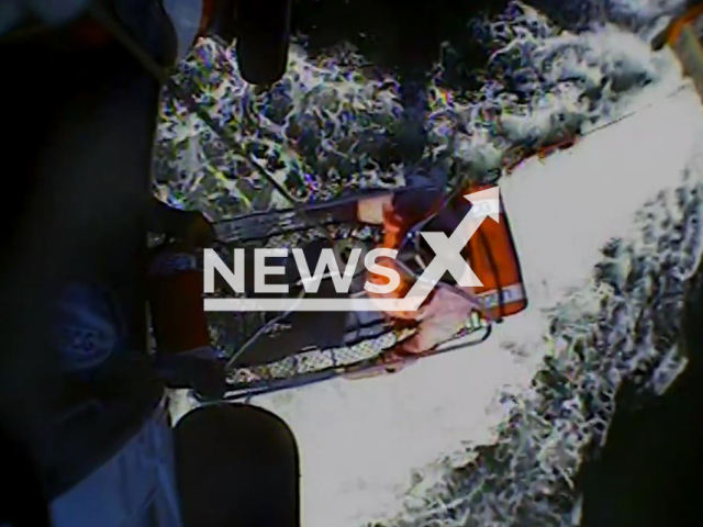 Coast guard rescue a fisherman that was in the water for 24 hours after his boat sank off in Empire, Louisiana, the USA on Oct. 9, 2022. Note: Photo is a screenshot from a video.(U.S. Coast Guard Heartland/Newsflash)