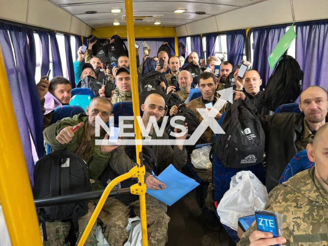 Picture shows freed Ukrainian soldiers in bus in Ukraine in undated photo. As result of the work of the Coordination Staff on the treatment of prisoners of war, 32 Ukrainian defenders were freed from Russian captivity to Ukraine. Note: Picture is obtained from the Ministry of Reintegration of the Temporarily Occupied Territories of Ukraine. (@minre.gov.ua/Newsflash)