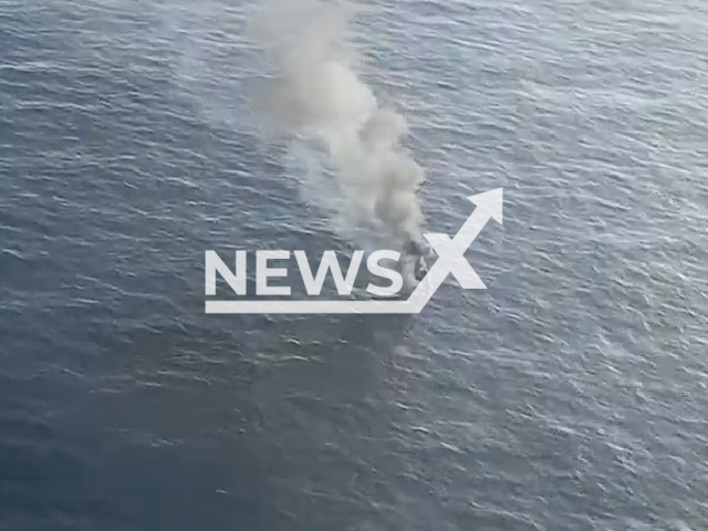 Picture shows the  sailboat 'La Flecha'  on fire off the coast of Cabo Silleiro, Spain, on Saturday, Oct. 8, 2022. Emergency crews rescued rescue of the two crew members on board. Note: Picture is a screenshot from a video. (@salvamentogob/Newsflash)