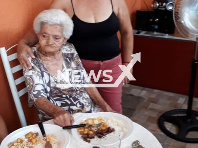 The 93-year-old woman Rosalia Martins Machado (pictured left), who died after suffering head trauma in Paranagua, Brazil, on 23rd February 2022 and her daughter Ana Lucia Machado (right). Note: A private photo. (@aninha.machado.3785/Newsflash)