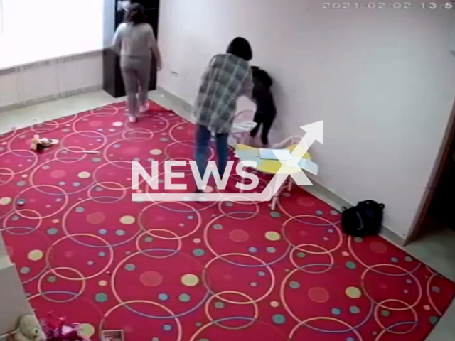 Two teachers beat a child in a kindergarten in Sochi, Russia, in an undated video. Both teachers reportedly got a job in another educational institution. Note: Picture is a screenshot from a video (Newsflash)