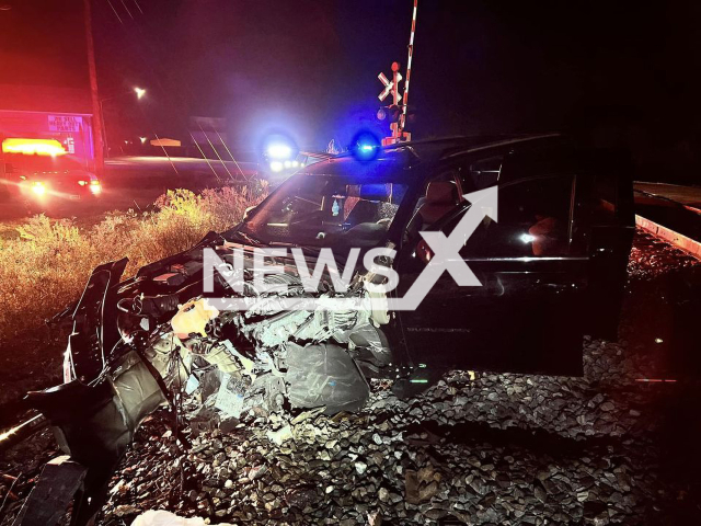 The SUV of Rodreka Morgan, 26, that   stalled on train  tracks, in Vienna, Georgia, USA, undated. Mayor Eddie Daniels, rescued the woman and her kids when a train was approaching. Note: Police photo. (Vienna Police Department/Newsflash)