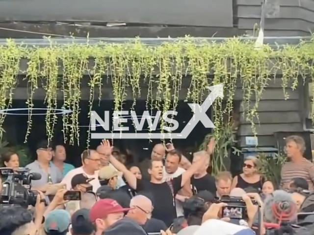 Taylor Delorean keeps his arms open as he shouts for freedom during a ceremony at the memorial site in Kuta, Bali, Indonesia, Wednesday, Oct. 12, 2022. He was arrested by the Kuta police for causing a public disturbance. Note: Picture is a screenshot from a video (Newsflash)