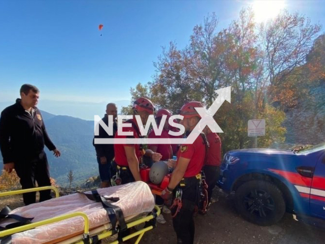 Photo shows the moment when British tourist Angus George Beaton, 27, was taken on a stretcher in Fethiye, Mugla, Turkey, undated photo. Beaton was reported to have several fractures after falling on rocks while paragliding. Note: Picture is private (Newsflash)