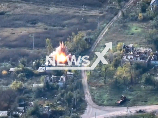 Ukrainian tankers destroy concentration of Russian soldiers hiding in the building in Donetsk region in Ukraine on Friday, Oct. 14. 2022. The 3rd Separate Tank Iron Brigade is a staffed unit of tank troops of the Ground Forces of the Armed Forces of Ukraine. Note: This picture is a screenshot from the video. (@Tretia.okrema.tankova.brygada/Newsflash)