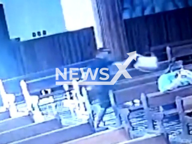 Woman's purse was stolen while she was praying in a church in Sao Paulo in Brazil. Note: Picture is a screenshot from a video (Newsflash)