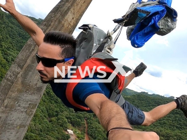 Eduardo Guermandi (38) who died after jumping with a wingsuit from a rock inside Castelo, Espirito Santo in Brazil.
Note: Private photo(@duguermandi/Newsflash).