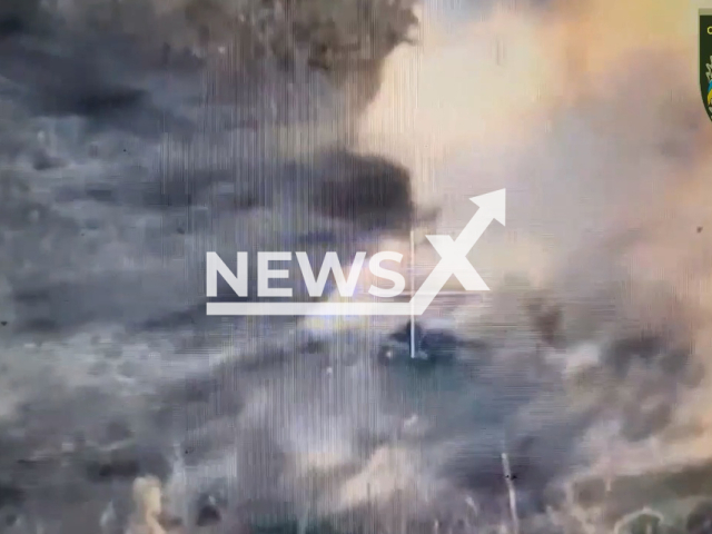 Picture shows Russian tank in explosion smoke in a field area in Ukraine in undated photo. Fighters of the separate brigade of the territorial defense of the city of Dnipro destroyed Russian T-80 battle tank with help of a javelin (surface-to-air missile). Note: Picture is a screenshot from a video (@BrTODnipro/Newsflash)