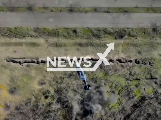 Ukrainian drone from the 74th separate reconnaissance battalion drops grenades on Russian soldiers in the trenches in Ukraine in undated footage.
The 74th separate reconnaissance battalion is part of the military intelligence of the ground forces of the Armed Forces of Ukraine.
Note: This picture is a screenshot from the video. (@AFUStratCom/Newsflash)