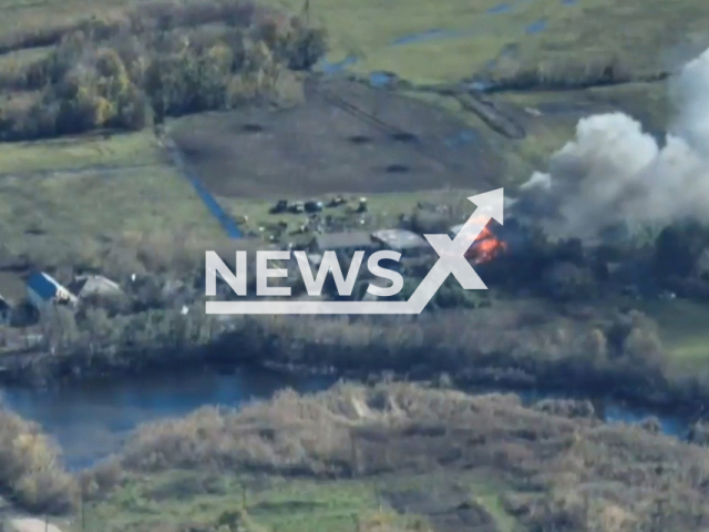 Hangar burns in a field area in one of the villages near Liman, Donetsk region in Ukraine in undated photo. Fighters of the 66th separate mechanized brigade of the Ground Forces of the Armed Forces of Ukraine shot at positions of Russian soldiers hiding in hangars. Note: Picture is a screenshot from a video (@66ombr/Newsflash)