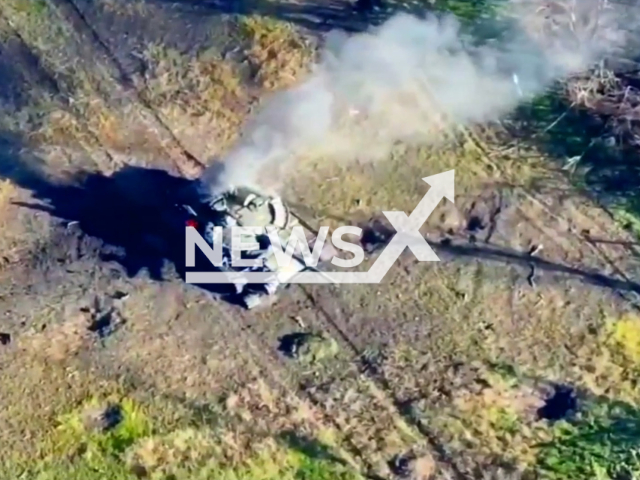 Russian T-72 tank burns in a field area near trees in Ukraine, Tuesday, Oct. 18, 2022. Dnipro separate brigade of the Territorial Defense Forces detected and destroyed Russian T-72 tank. Picture is a screenshot from a video (Dnipro separate brigade/Newsflash)