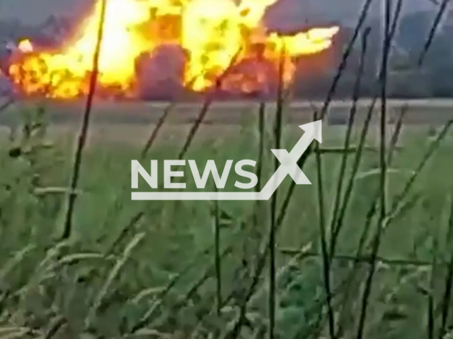 Picture shows an explosion in a residential area of Ukraine in undated photo. Soldier of the 72nd Separate Mechanized Brigade named after the Black Zaporozhians hit Russian tank. Note: Picture is a screenshot from a video (@72.brigade.best/Newsflash)