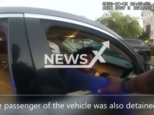 Atlanta Police Officers arrest two suspects after finding a bag containing 518 grams of marijuana and two handguns inside their vehicle, in Atlanta, Georgia, in the USA, on Oct. 9th 2022. The two suspects were later charged and taken to the Fulton County Jail. Note: Picture is screenshot from a video. (@Atlanta_Police/Newsflash)