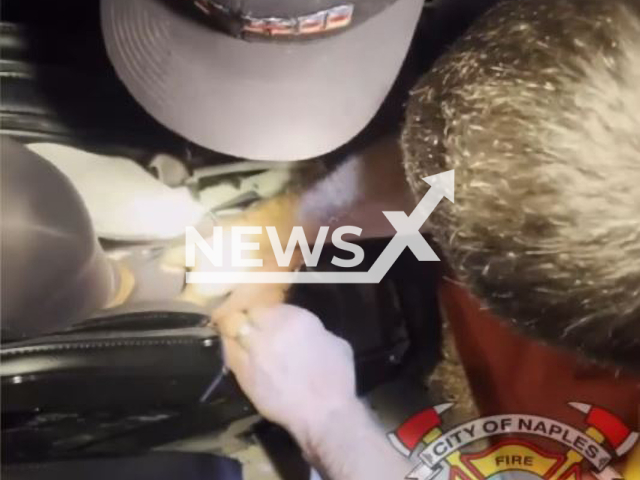 Firefighters rescue woman with a foot caught in a massage chair in Naples Florida, United States in an undated video. Note: Picture is screenshot from a video. (Naples Fire-Rescue Department/Newsflash)