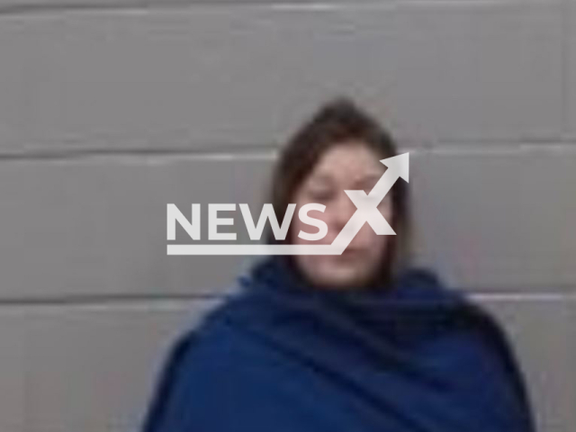 Catherine Jarvey, 32, poses in undated photo. She was charged with two counts of injury to a child and exploitation of a child,  after a detective doing a welfare check found her  6-year-old son, who weighed only 15 pounds (6.803 kilogrammes), lying in a crib, in Wichita Falls, Texas, USA, on Sept. 21,  2022. 
 Note: Private photo.  (Wichita County Jail/Newsflash)