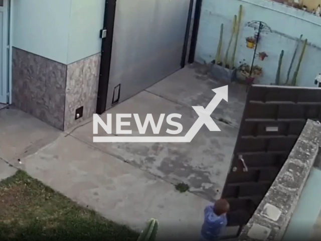 A 21-month-old boy leaves his  yard, goes out on the street in Casilda, Argentina, on Set. 23, 2022. The  dogs barked and warned the mother, who went out to look for him, Note: Picture is a screenshot from a video (Newsflash)