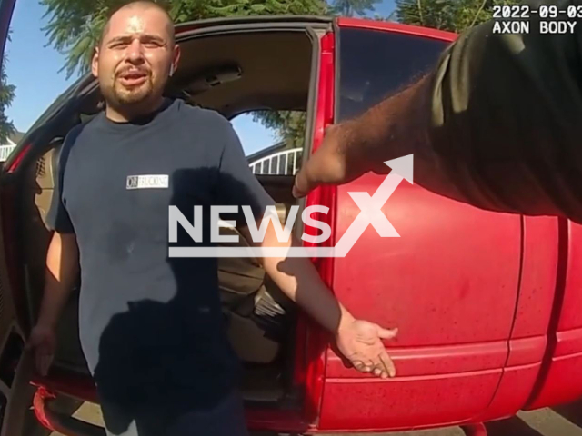 Police officer giving orders to the suspect before they arrest him in Riverside County, California, USA on Saturday, Sept. 3, 2022.Note: The picture is a screenshot from a video (Riverside County Sheriff's Department/Newsflash)