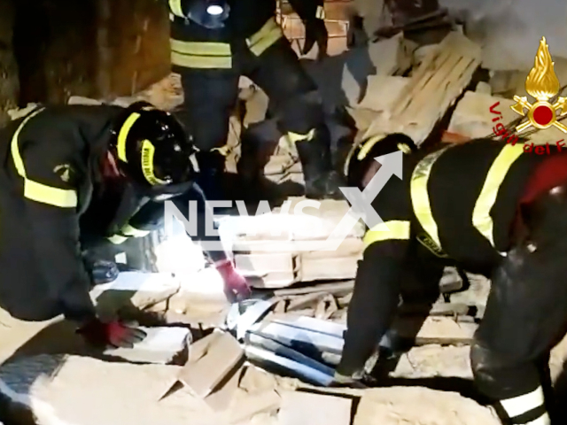 Firefighters clear out rubble from a collapsed attic in a building in Melissano, Italy, on Oct. 20, 2022. The building was uninhabited and there were no victims. Note: Picture is screenshot from a video (Vigili del Fuoco/Newsflash)