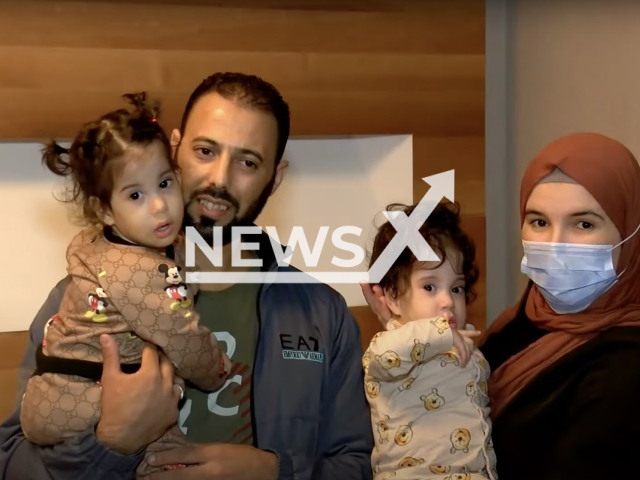 Photo shows the conjoined twins from Algeria, who were separated following a successful operation in Istanbul, Turkey, with their parents in an undated photo. The twins are ready to be discharged from the hospital following four months of treatment. Note: Picture is a screenshot from a video (Newsflash)