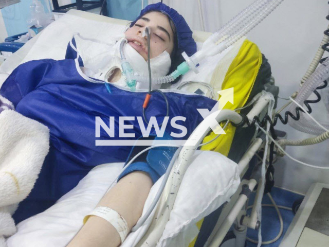 Arnika Ghaem Maghami lies on a hospital bed in an undated photo. She reportedly died after she received several blows to the head by security forces during the protests in Iran. Note: Picture is private (Newsflash)