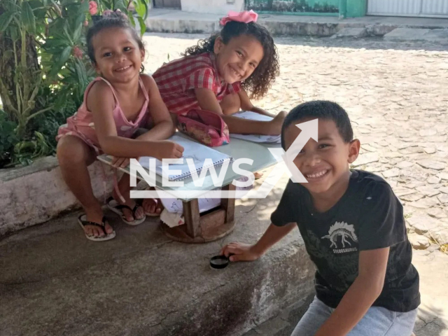 The siblings Maria Eloa (left), Francisca Aylla (middle) and Francisco Ayllan (right) pose in an undated photo. They all died following a house fire in Parnaiba, on the coast of Piaui, Brasil. Note: Picture is private (Newsflash)