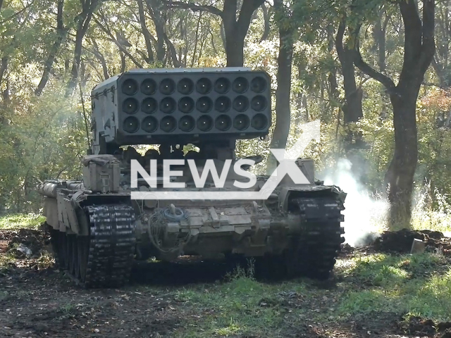 Picture shows Russian heavy flamethrower system TOS-1A "Solntsepek" before start of the combat mission in Ukraine in undated footage.
TOS-1 is a Soviet 220 mm 30-barrel or 24-barrel multiple rocket launcher capable of using thermobaric warheads, mounted on a T-72 tank chassis.
Note: This picture is a screenshot from the video.
(Ministry of Defense of Russia/Newsflash)