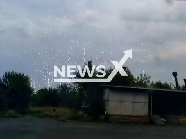 White phosphorus munitions fall from the sky on the territory of Velika Novosilka, Donetsk region in Ukraine in undated footage.
Ukrainian National Guard stressed that Russian military is using phosphorous projectiles prohibited by the Geneva Convention. 
Note: This picture is a screenshot from the video. (National Guard of Ukraine/Newsflash)