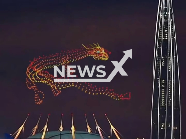 Massive dragon composed of hundreds of drones, in Saint Petersburg, Russia, in February 2022. Drone shows are performed by synchronized and choreographed groups of drones that arrange themselves into different formations. Note: Picture is a screenshot from a video (@geoscan.show/Newsflash)