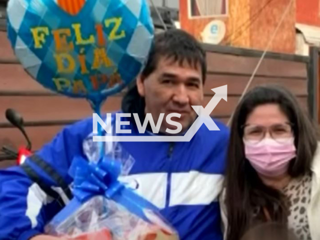 Church security guard Pedro Carvajal,  and unidentified woman pose in undated photo.  A pastor did not help the man who suffered from a cardiovascular accident instead prayed for 7 hours before taking him to a hospital, because he believed it was a spiritual issue,   in Santiago, Chile.  
Note: Private photo.  (Newsflash)