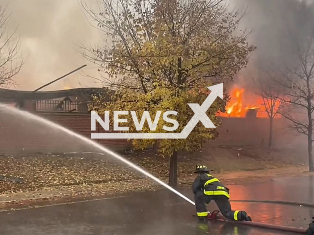 Firefighters extinguish the fire in Chicago, Illinois, USA on Tuesday, Oct. 25, 2022. Note: Picture is screenshot from a video (Chicago Fire Media/Newsflash)