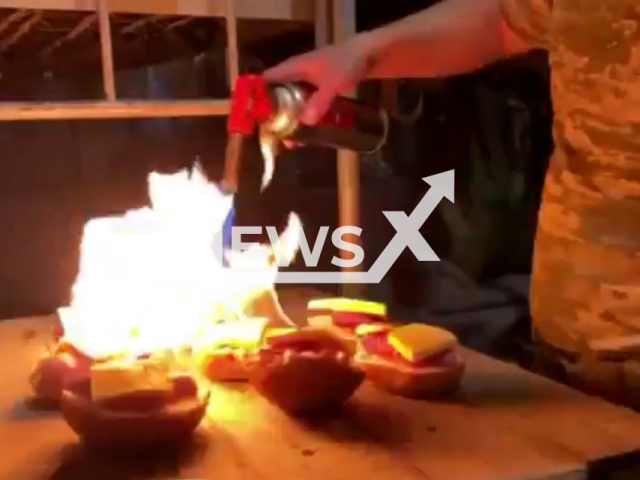 Solider from the 6th separate battalion of the DUK PS of the Armed Forces of Ukraine prepares cooking hot sandwiches in a military way in Ukraine in undated footage.
The Right Sector Ukrainian Volunteer Corps or simply the Ukrainian Volunteer Corps is the paramilitary arm of far-right Ukrainian nationalist party Right Sector.
Note: This picture is a screenshot from the video. (@AFUkraine/Newsflash)