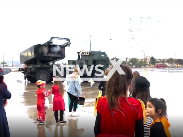 HIMARS (High Mobility Artillery Rocket System) shoots with candies in Oklahoma, USA, Monday, Oct.31, 2022. US military personnel handed out Halloween candy to children with HIMARS multiple rocket launchers at the Fort Sill military base. Note: This picture is a screenshot from the video. (@officialftsill/Newsflash)