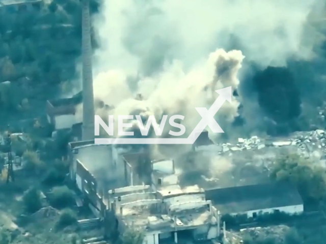 Picture shows an explosion in a residential area in Ukraine in undated photo. Air reconnaissance of the Kastuś Kalinoŭski Regiment (a group of Belarusian volunteers, which was formed to defend Ukraine against the 2022 Russian invasion) and 44th brigade of Ukrainian Army used UAV (unmanned aerial vehicle) to detect Russian targets and correct artillery firing. Note: Picture is a screenshot from a video (@belwarriors/Newsflash)