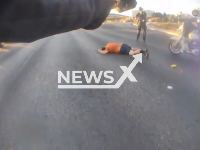 Police officer shoots the suspect on a busy street in Henderson, Nevada, USA on Monday, Sept.26, 2022. Note: Picture is a screenshot from a video (Henderson Police Department/Newsflash)