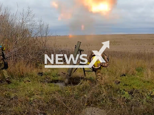 Artillerymen of National Guard of Ukraine shoot a mortar in a field area Ukraine in undated photo. The Day of Missile Troops and Artillery is celebrated annually in Ukraine on November 3, since 1997. Note: Picture is screenshot from a video (@NGUmainpage/Newsflash)