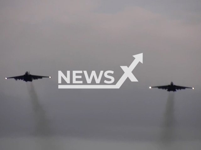 Two Russian Su-25s flies on a combat mission in Ukraine in undated footage.
According to the Russian MoD as a result of the combat use of aviation weapons, camouflaged fortified field positions and armored vehicles of the Armed Forces of Ukraine were destroyed.
 Note: Ministry of Defense photo. (Ministry of Defense of Russia/Newsflash)