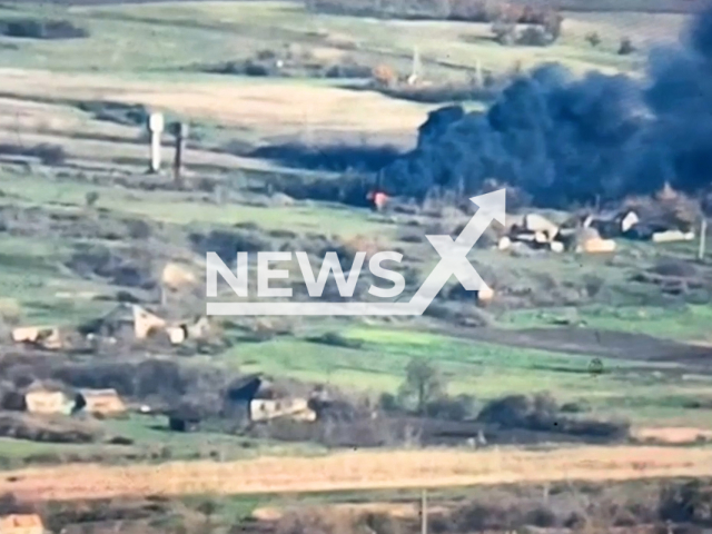 Picture shows an explosion in a residential area in the Bakhmut direction, Donetsk region of Ukraine in undated photo. Fighters of the 93rd Independent Kholodnyi Yar Mechanized Brigade destroyed Russian warehouses with ammunition and KAMAZ vehicles.  Note: This picture is a screenshot from the video (@93OMBr/Newsflash).