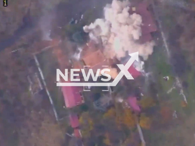 Picture shows an explosion in a residential area near Pervomaiske settlement, Donetsk region of Ukraine in undated photo. Artillerymen of the 11th regiment of the People's Militia of the DPR shot at Ukrainian temporary deployment point and self-propelled guns. Note: This picture is a screenshot from the video (@nm_dnr/Newsflash).