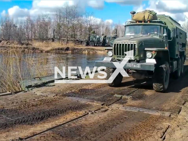 Overcoming a water barrier by units of the RF Armed Forces during a special military operation in Ukraine. Note: Photo is a screenshot from the video (Ministry of Defense of Russia/Newsflash)