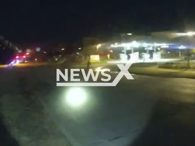 A police officer arrests the suspect after a foot chase in Richardson, Texas, USA on Monday, Oct.31, 2022.  Note: Picture is screenshot from a video (Richardson Police Department/Newsflash).